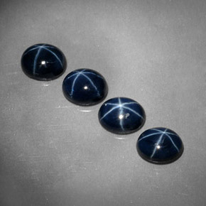 Gemas de zafiro estrella azul natural de  ct, corte óvalo, opaco