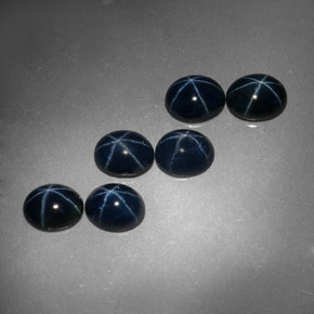 Gemas de zafiro estrella azul natural de  ct, corte óvalo, opaco