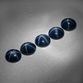 Gemas de zafiro estrella azul natural de  ct, corte óvalo, opaco