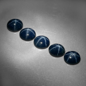 Gemas de zafiro estrella azul natural de  ct, corte óvalo, opaco