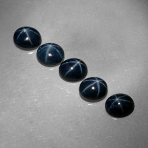 Gemas de zafiro estrella azul natural de  ct, corte óvalo, opaco