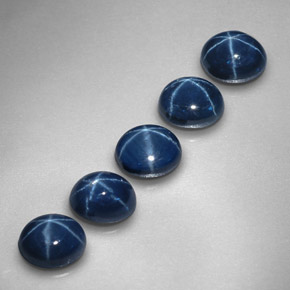 Gemas de zafiro estrella azul natural de  ct, corte óvalo, opaco