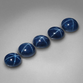 Gemas de zafiro estrella azul natural de  ct, corte óvalo, opaco