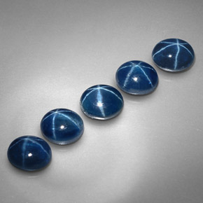 Gemas de zafiro estrella azul natural de  ct, corte óvalo, opaco