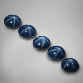 Gemas de zafiro estrella azul natural de  ct, corte óvalo, opaco