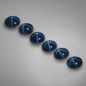 Gemas de zafiro estrella azul natural de  ct, corte óvalo, opaco