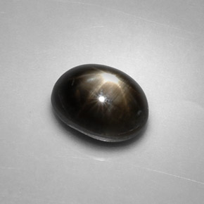 Zafiro estrella negro natural de 2,48 ct, corte óvalo, opaco