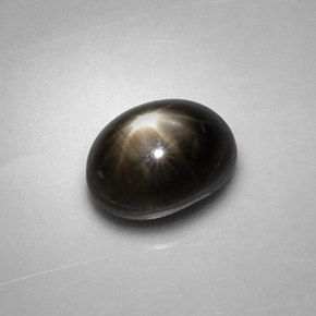 Zafiro estrella negro natural de 2,48 ct, corte óvalo, opaco