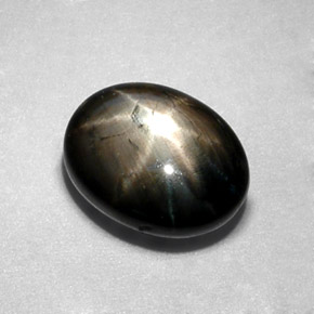 Zafiro estrella negro natural de 2,30 ct, corte óvalo, opaco