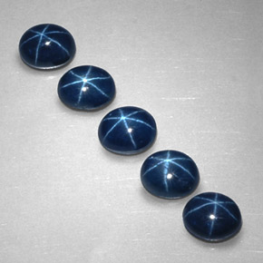 Gemas de zafiro estrella azul natural de  ct, corte óvalo, opaco