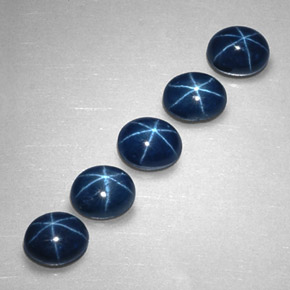 Gemas de zafiro estrella azul natural de  ct, corte óvalo, opaco