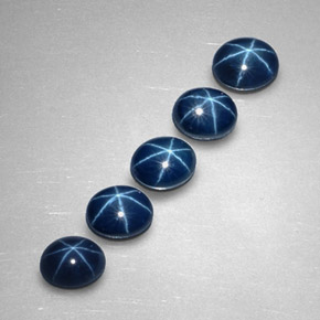 Gemas de zafiro estrella azul natural de  ct, corte óvalo, opaco
