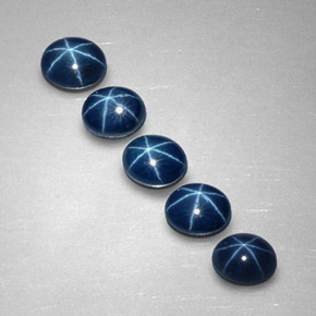 Gemas de zafiro estrella azul natural de  ct, corte óvalo, opaco