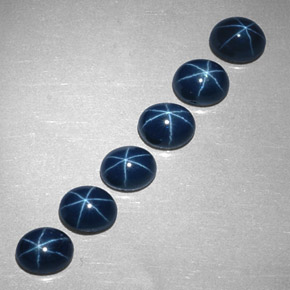 Gemas de zafiro estrella azul natural de  ct, corte óvalo, opaco