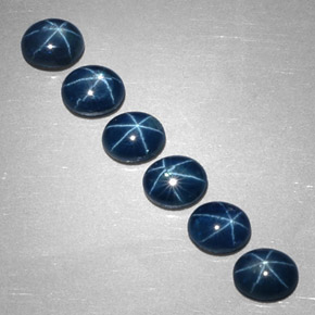 Gemas de zafiro estrella azul natural de  ct, corte óvalo, opaco