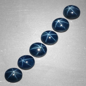 Gemas de zafiro estrella azul natural de  ct, corte óvalo, opaco
