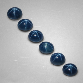 Gemas de zafiro estrella azul natural de  ct, corte óvalo, opaco
