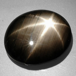 Zafiro estrella negro natural de 9,26 ct, corte óvalo, opaco
