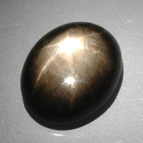Zafiro estrella negro natural de 7,90 ct, corte óvalo, opaco