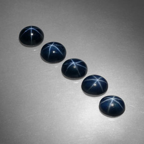 Gemas de zafiro estrella azul natural de  ct, corte óvalo, opaco