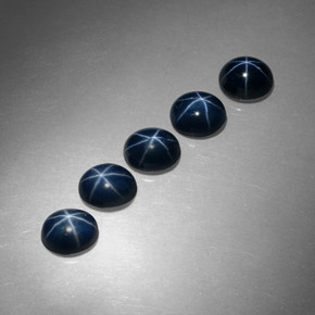 Gemas de zafiro estrella azul natural de  ct, corte óvalo, opaco