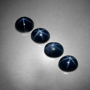 Gemas de zafiro estrella azul natural de  ct, corte óvalo, opaco