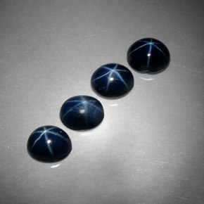 Gemas de zafiro estrella azul natural de  ct, corte óvalo, opaco