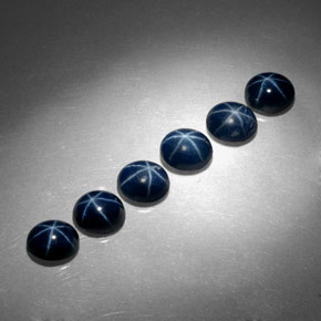 Gemas de zafiro estrella azul natural de  ct, corte óvalo, opaco