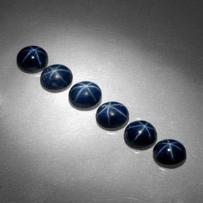 Gemas de zafiro estrella azul natural de  ct, corte óvalo, opaco