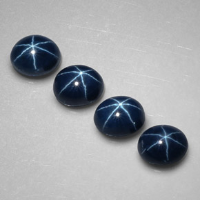 Gemas de zafiro estrella azul natural de  ct, corte óvalo, opaco