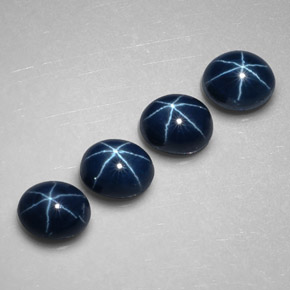 Gemas de zafiro estrella azul natural de  ct, corte óvalo, opaco