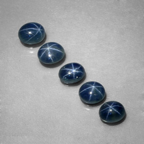 Gemas de zafiro estrella azul natural de  ct, corte óvalo, translúcido
