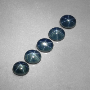 Gemas de zafiro estrella azul natural de  ct, corte óvalo, translúcido