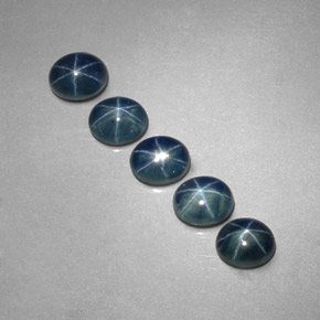 Gemas de zafiro estrella azul natural de  ct, corte óvalo, translúcido