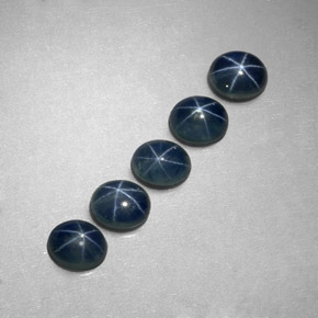 Gemas de zafiro estrella azul natural de  ct, corte óvalo, translúcido
