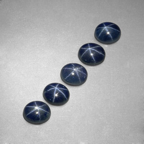 Gemas de zafiro estrella azul natural de  ct, corte óvalo, translúcido