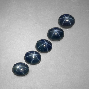 Gemas de zafiro estrella azul natural de  ct, corte óvalo, translúcido