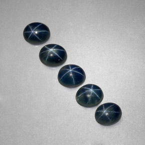 Gemas de zafiro estrella azul natural de  ct, corte óvalo, translúcido