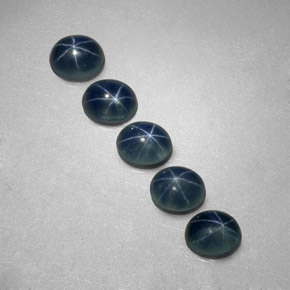 Gemas de zafiro estrella azul natural de  ct, corte óvalo, translúcido