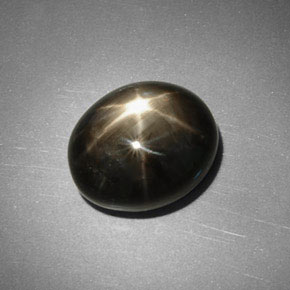 Zafiro estrella negro natural de 5,75 ct, corte óvalo, opaco