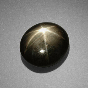 Zafiro estrella negro natural de 9,85 ct, corte óvalo, opaco
