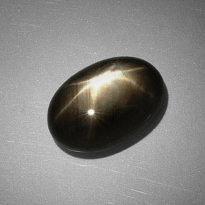 Zafiro estrella negro natural de 7,83 ct, corte óvalo, opaco