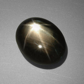 Zafiro estrella negro natural de 11,40 ct, corte óvalo, opaco