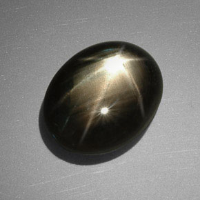 Zafiro estrella negro natural de 11,40 ct, corte óvalo, opaco