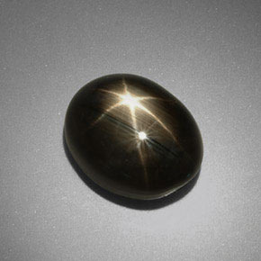 Zafiro estrella negro natural de 9,92 ct, corte óvalo, opaco