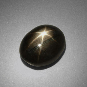Zafiro estrella negro natural de 9,92 ct, corte óvalo, opaco
