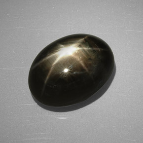 Zafiro estrella negro natural de 9,24 ct, corte óvalo, opaco