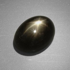 Zafiro estrella negro natural de 7,55 ct, corte óvalo, opaco