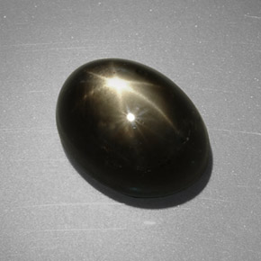 Zafiro estrella negro natural de 7,55 ct, corte óvalo, opaco