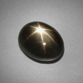 Zafiro estrella negro natural de 5,66 ct, corte óvalo, opaco